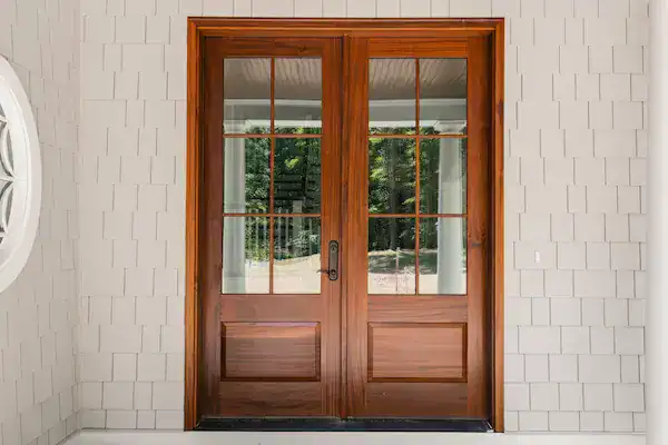 Elegant wooden patio double doors with glass panels